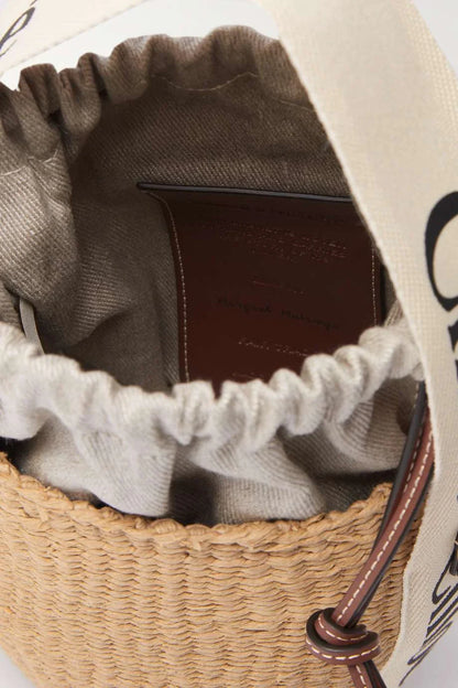 CHLO_ Woody small leather-trimmed raffia basket bag