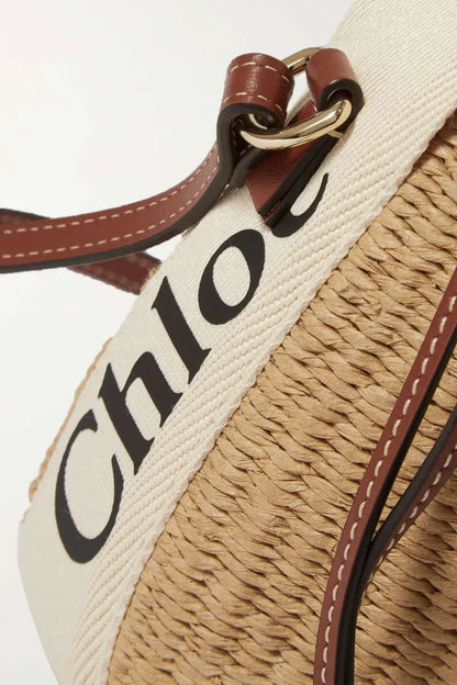 CHLO_ Woody small leather-trimmed raffia basket bag